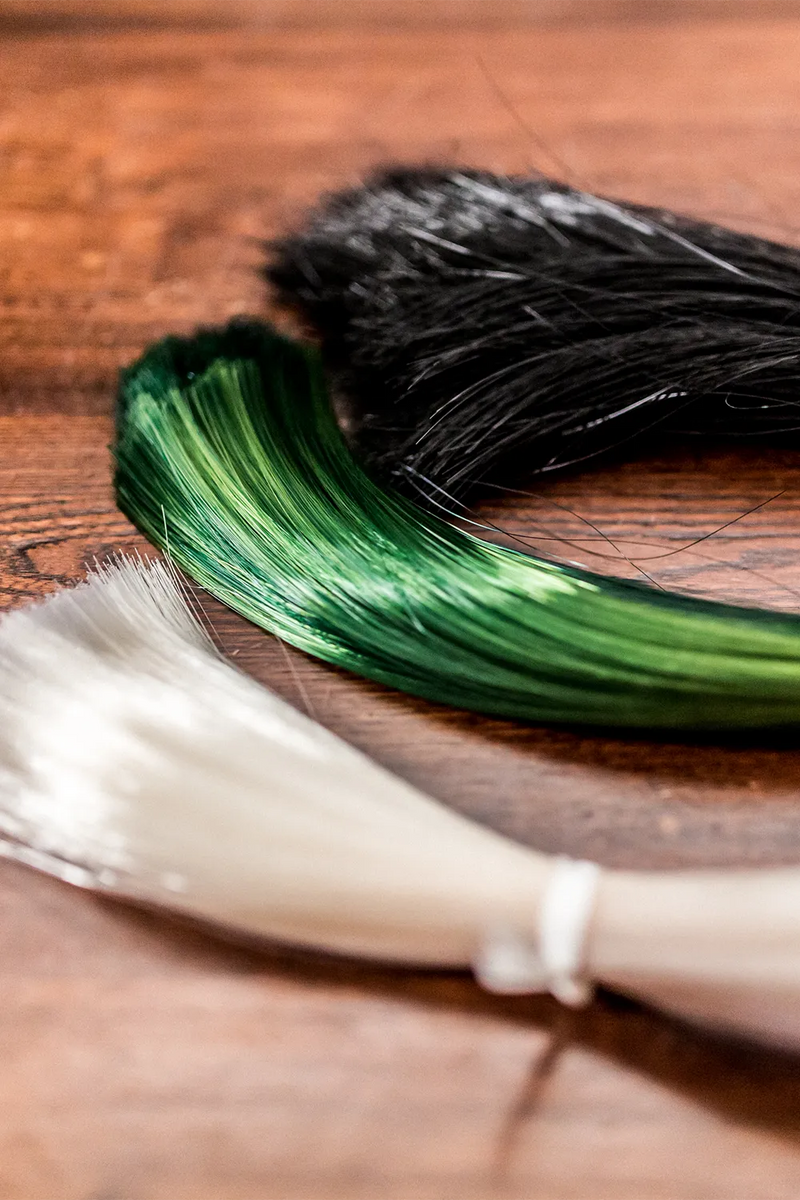 Coruss bow hair at the workbench